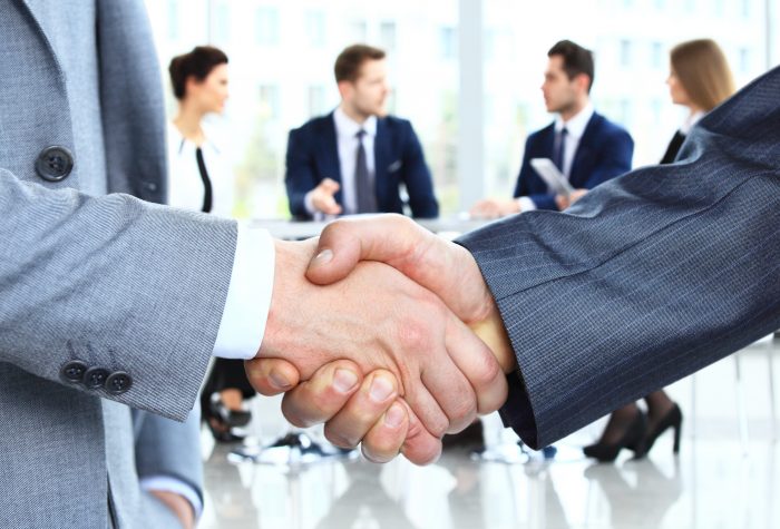 Handshake over a business meeting